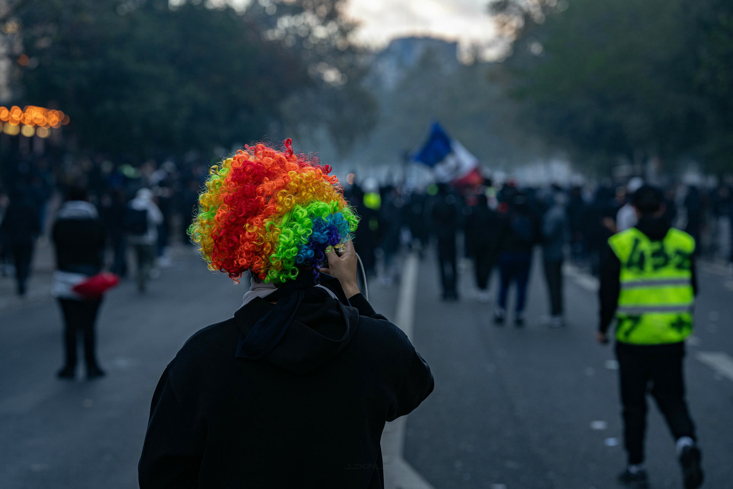 A protester in a rainbow wig during the Oct. 17 demonstrations in Paris
