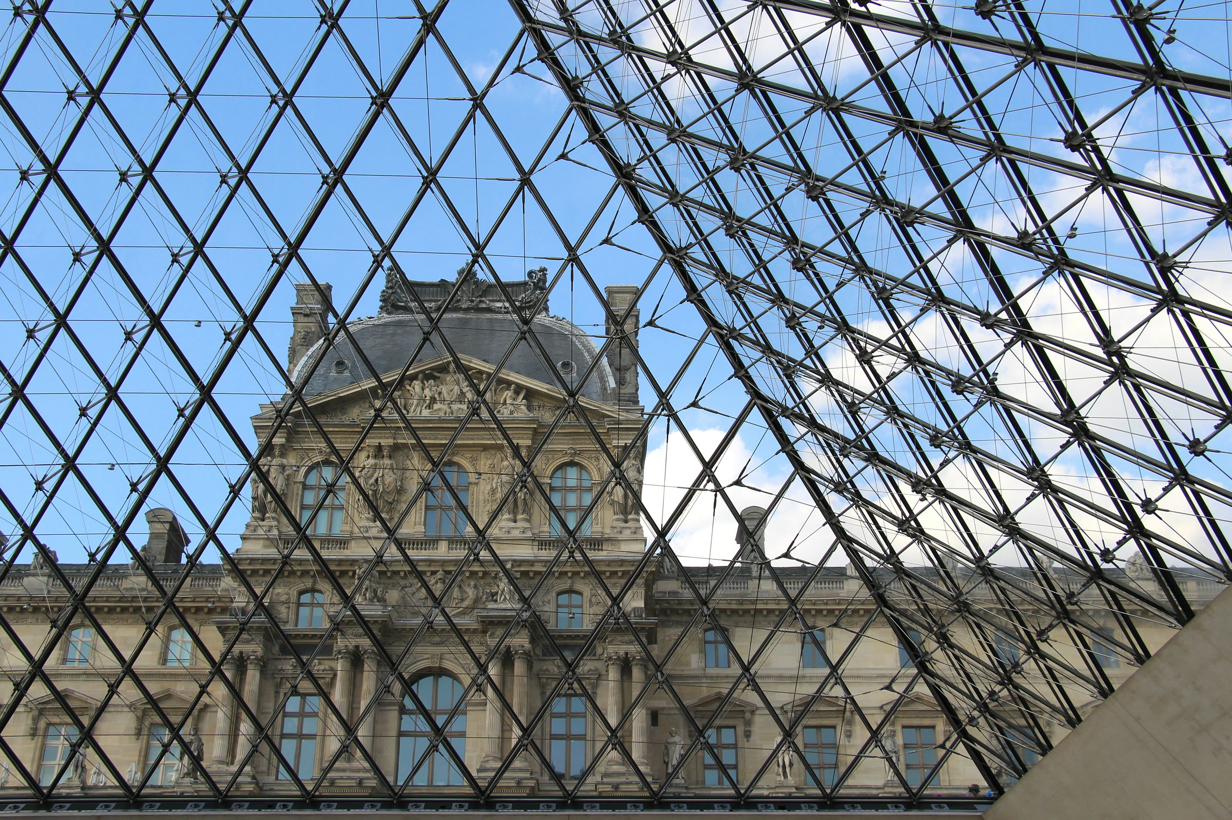 The Louvre Palace seen from inside the glass pyramid