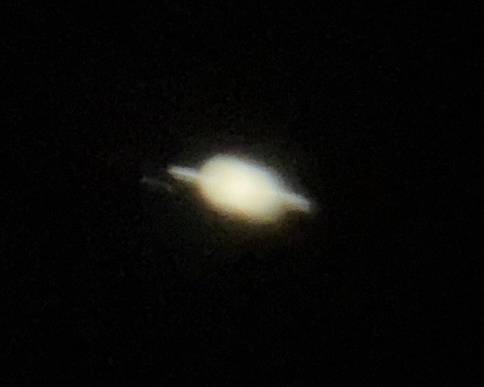 Saturn photographed through an amateur telescope