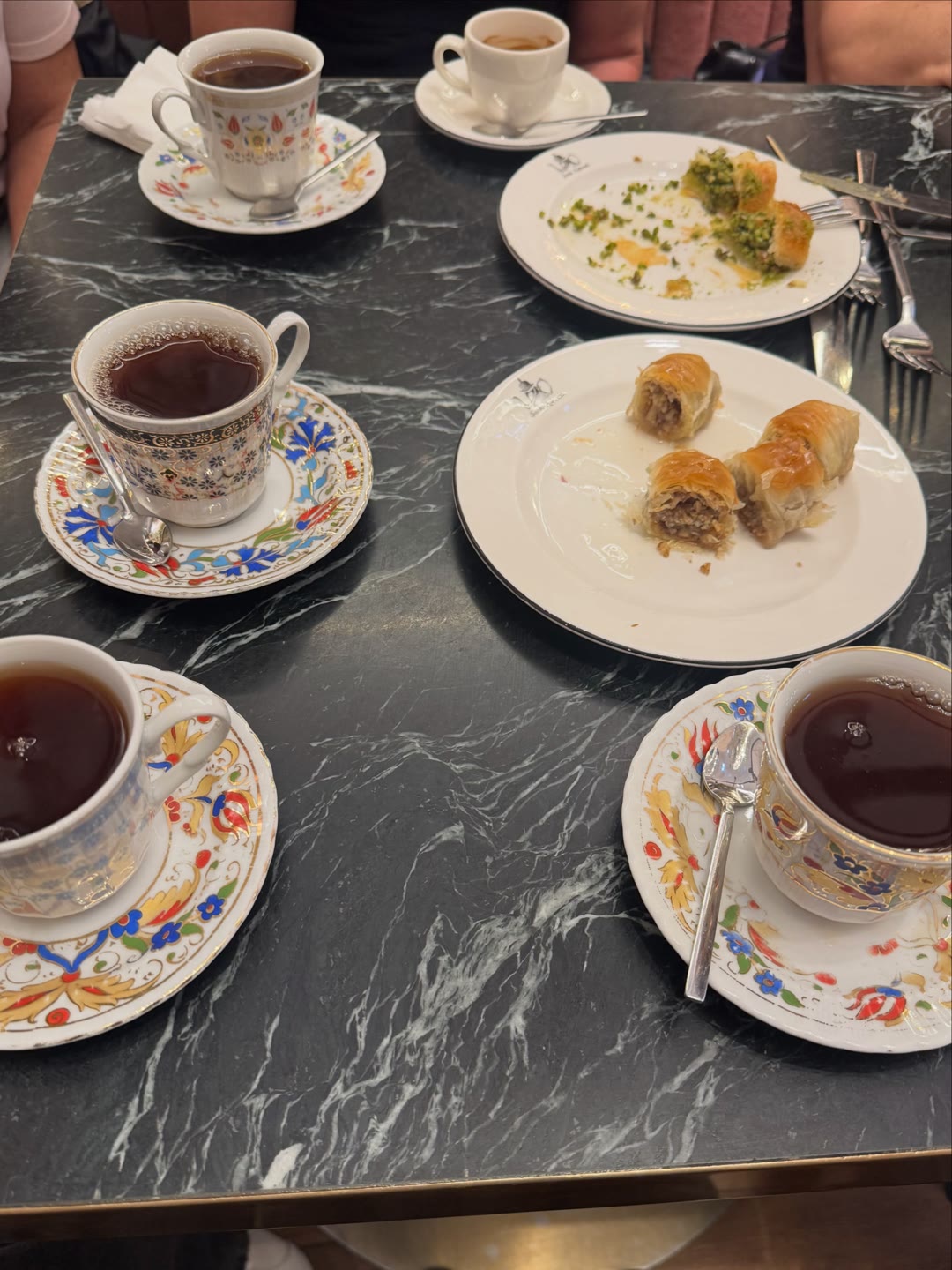 Baklava and tea on Sheila Ebana’s table
